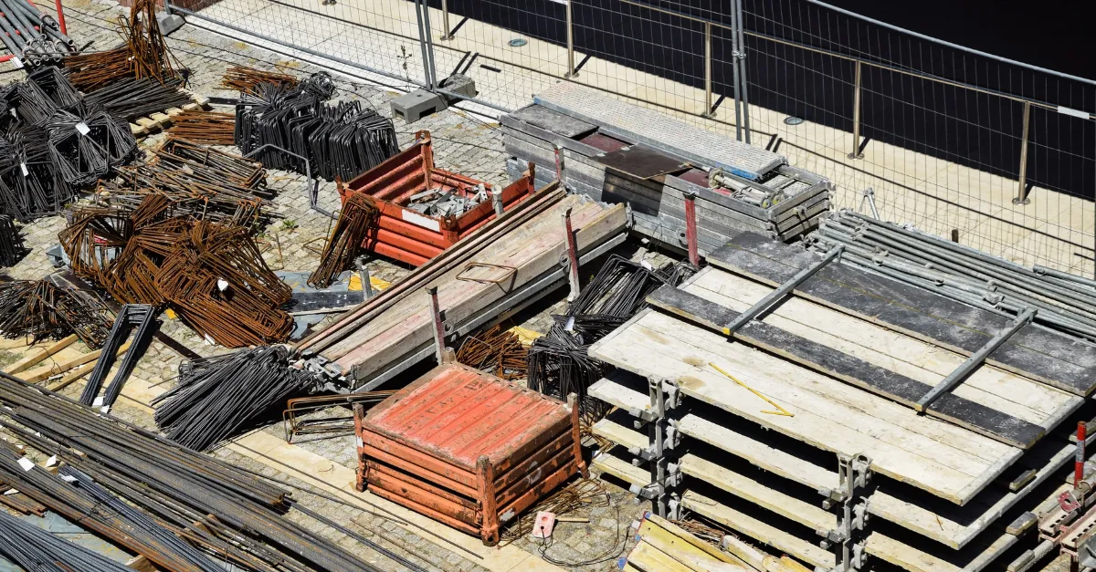 Aerial view of scaffold, rebar and timber stored across a construction site